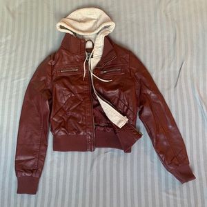 Burgundy jean jacket with a gray/cream hoodie